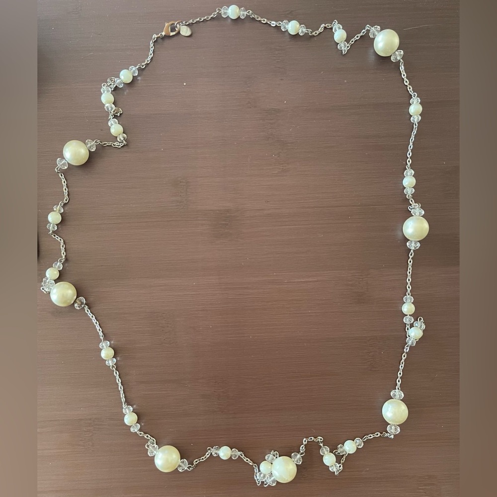 Long strand with pearl-like and clear crystal beads